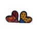 SET OF ROMERO BRITTO HEART SHAPED SALT AND PEPPER SHAKERS