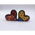 SET OF ROMERO BRITTO HEART SHAPED SALT AND PEPPER SHAKERS