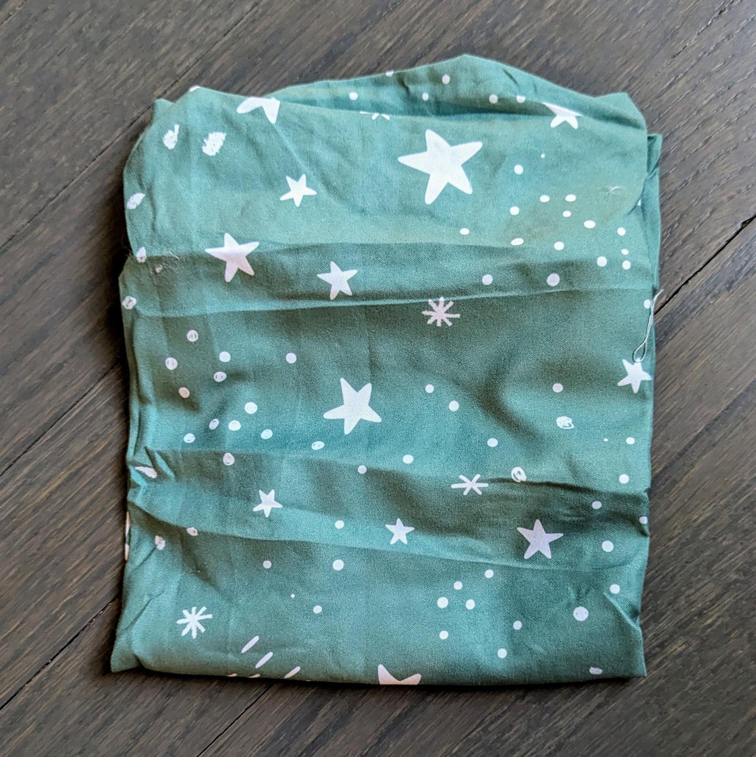 The Peanutshell Fitted Bassinet Sheet Set, Green Stars