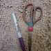 Purple Sharpie and scissors