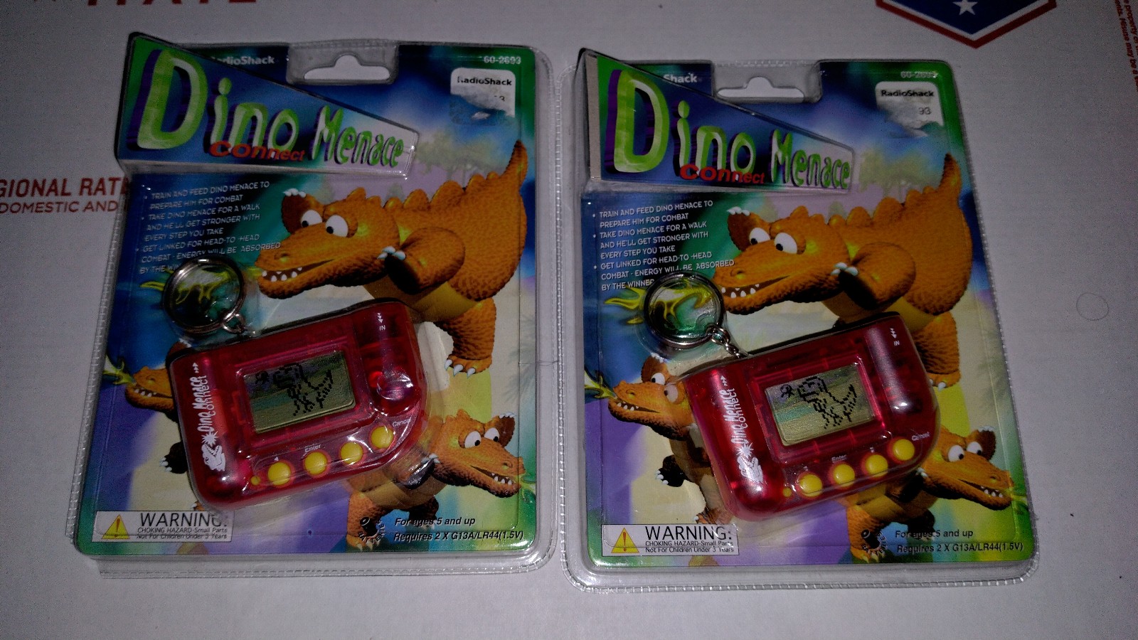 2 Vintage Radio Shack Dino Menace Connect Interactive Pets NEW Tamagotchi