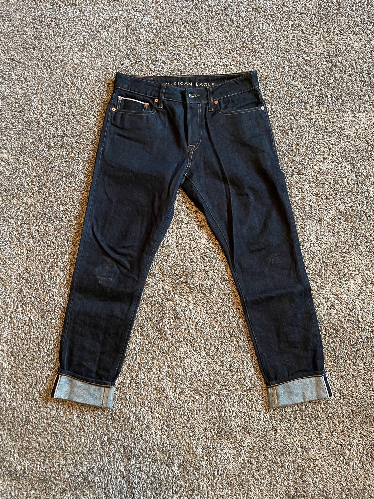 American Eagle raw denim jeans