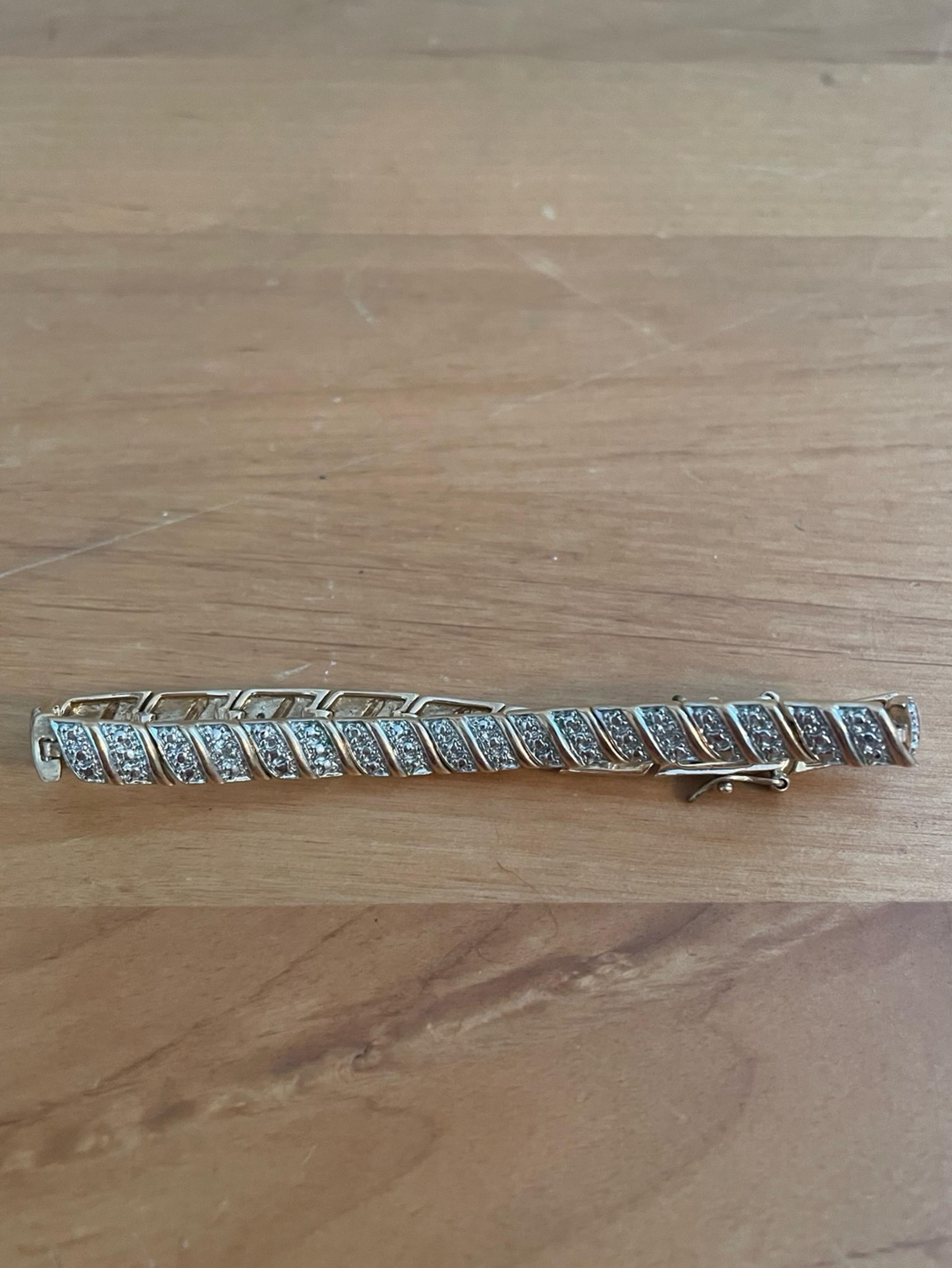 Diamond accent tennis bracelet Gold plated over sterling silver from Kay Jeweler