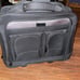 Computer bag / carry on luggage with wheels and handle that extends 3 feet