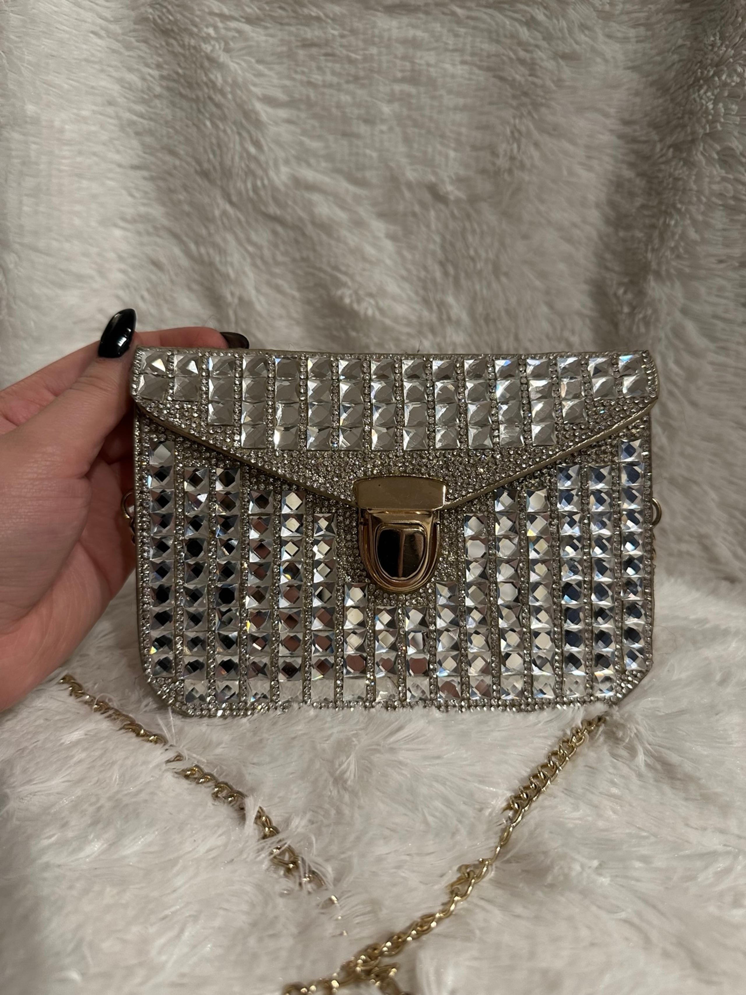 Sparkly silver clutch bag with gold chain #glamour