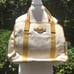 Michael Kors tan and yellow with MK emblem canvas tote