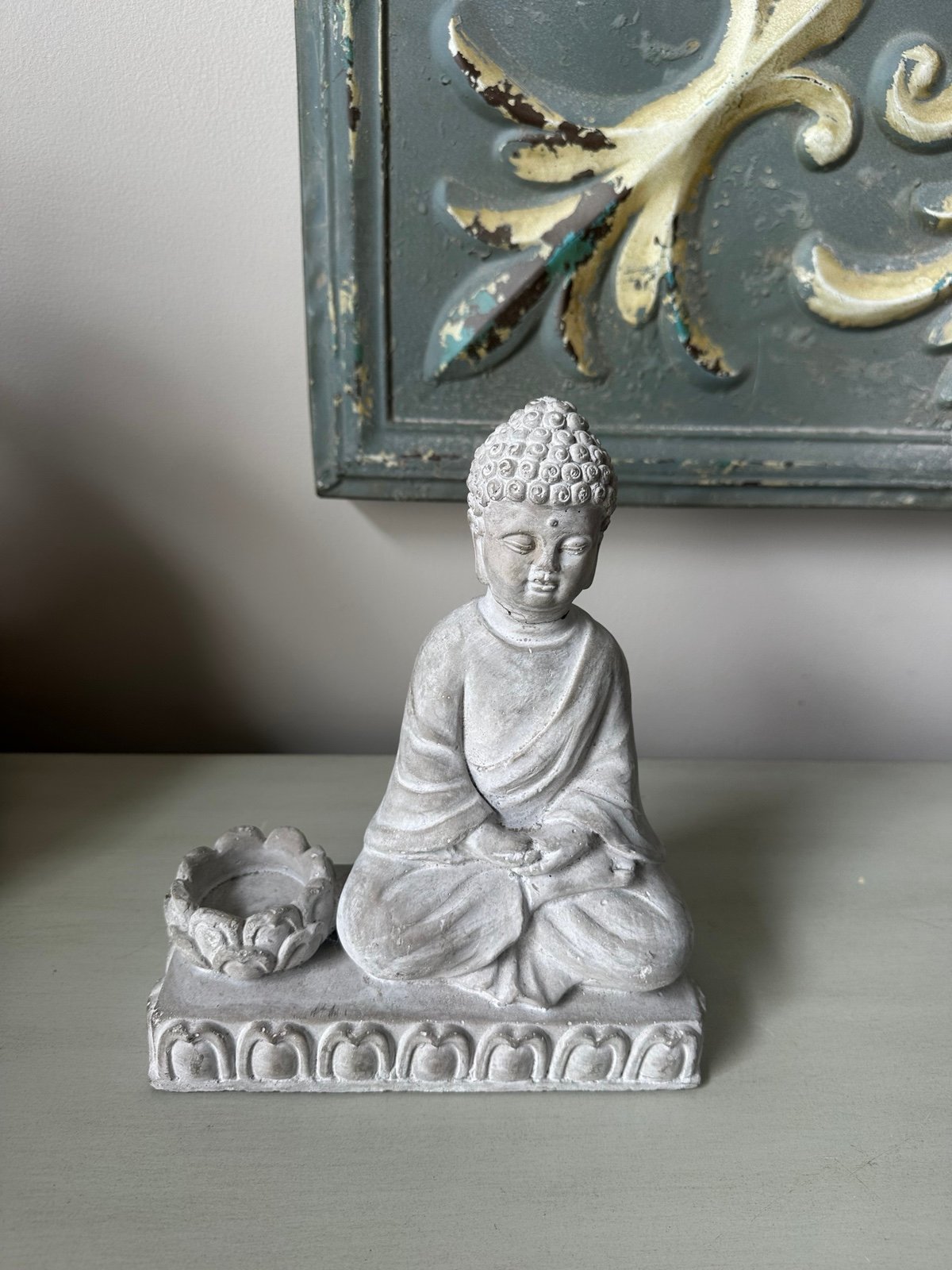 Buddha concrete statue with candle incense holder