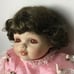 Beautiful doll in pink lace dress Signed Vintage