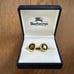 Burberry's Gold-Tone Dark Green Cufflinks