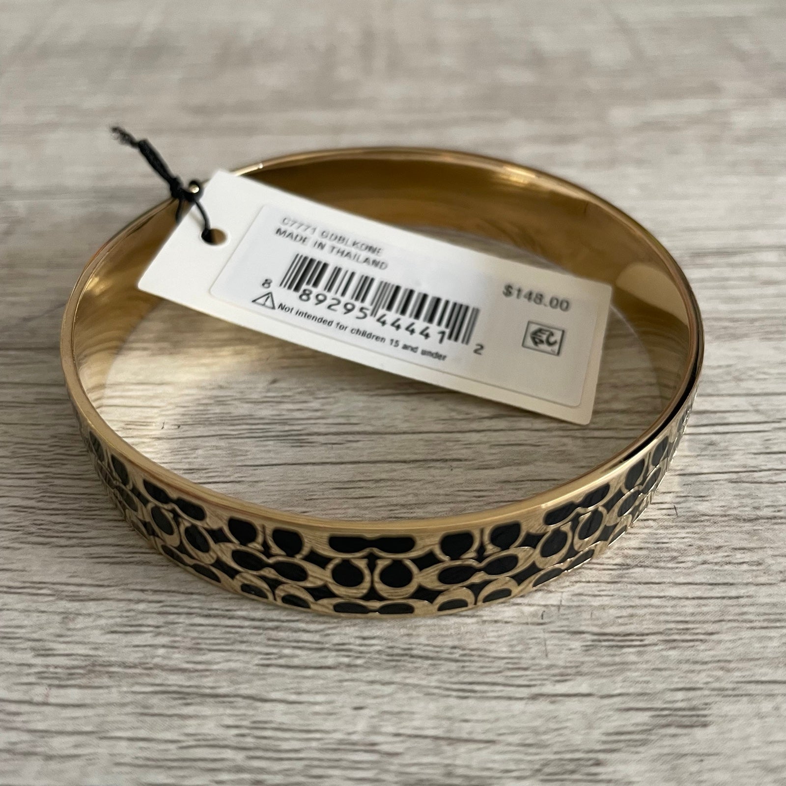 COACH - Gold Black Signature Logo Bangle