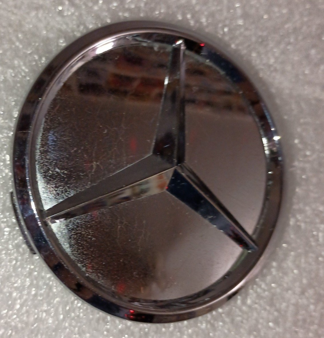 1 Slightly used Mercedes Benz 2pc chromed center cap