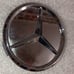1 Slightly used Mercedes Benz 2pc chromed center cap