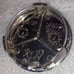1 Slightly used Mercedes Benz 2pc chromed center cap