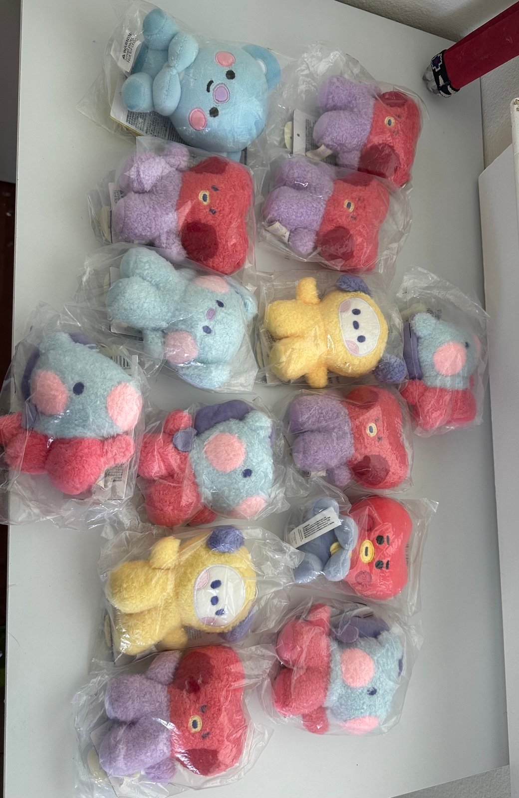 LINE FRIENDS "minini" plush keychains.