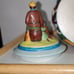 Cookie Jar German Scene Turquoise Aqua w/Pitcher Man Sitting on Log Rare Vintage