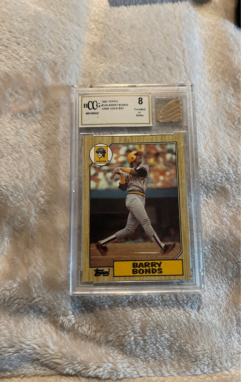 1997 topps #320 Barry Bonds with game with used bat piece BCCG graded 8
