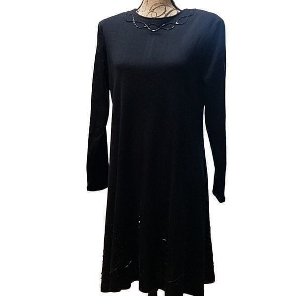 Vintage Liz Claiborne dress. Beautiful detail by hand a great vintage find.size