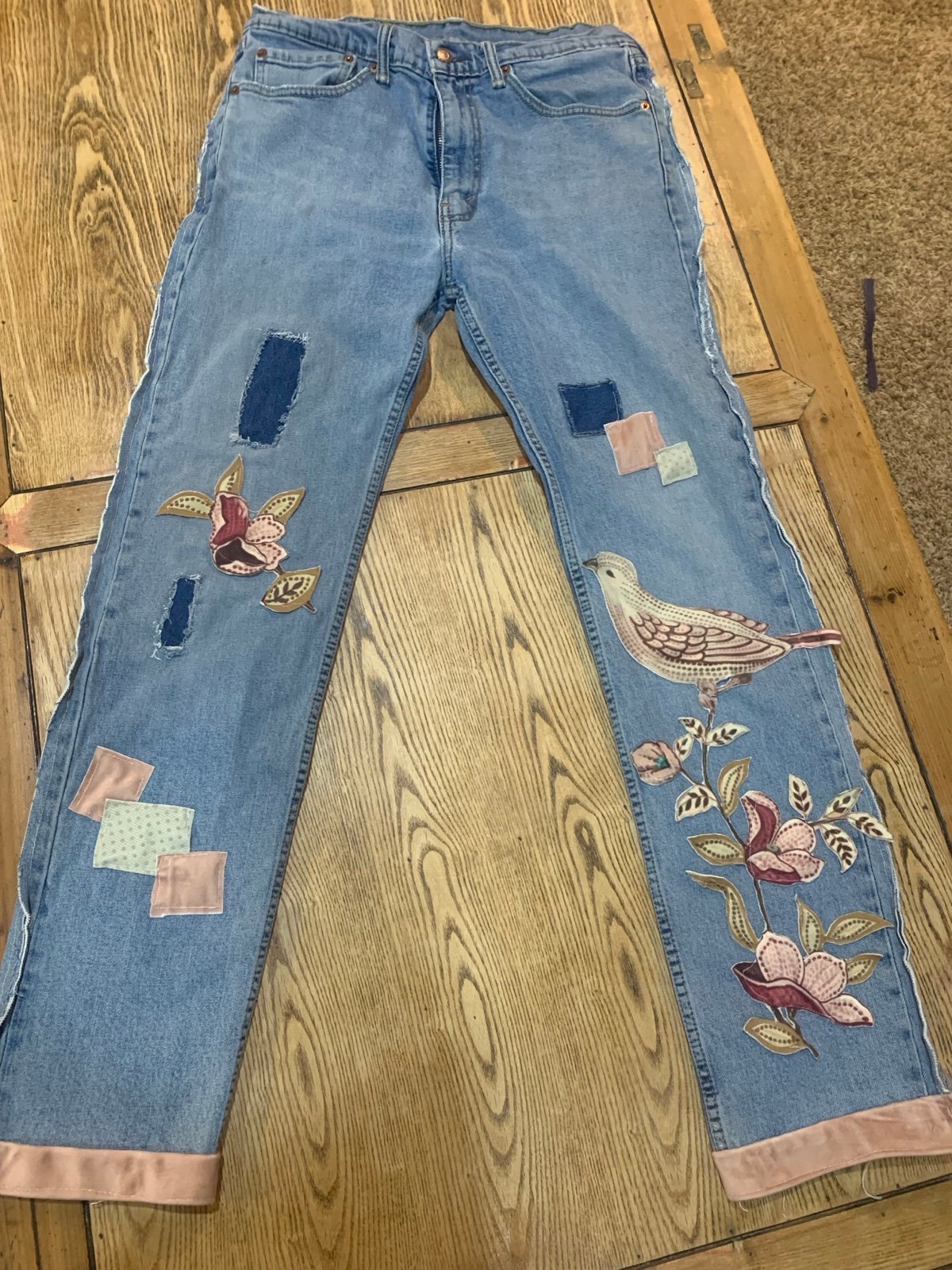 Newly Upcycled 505 Levi jeans with bird and floral appliqué