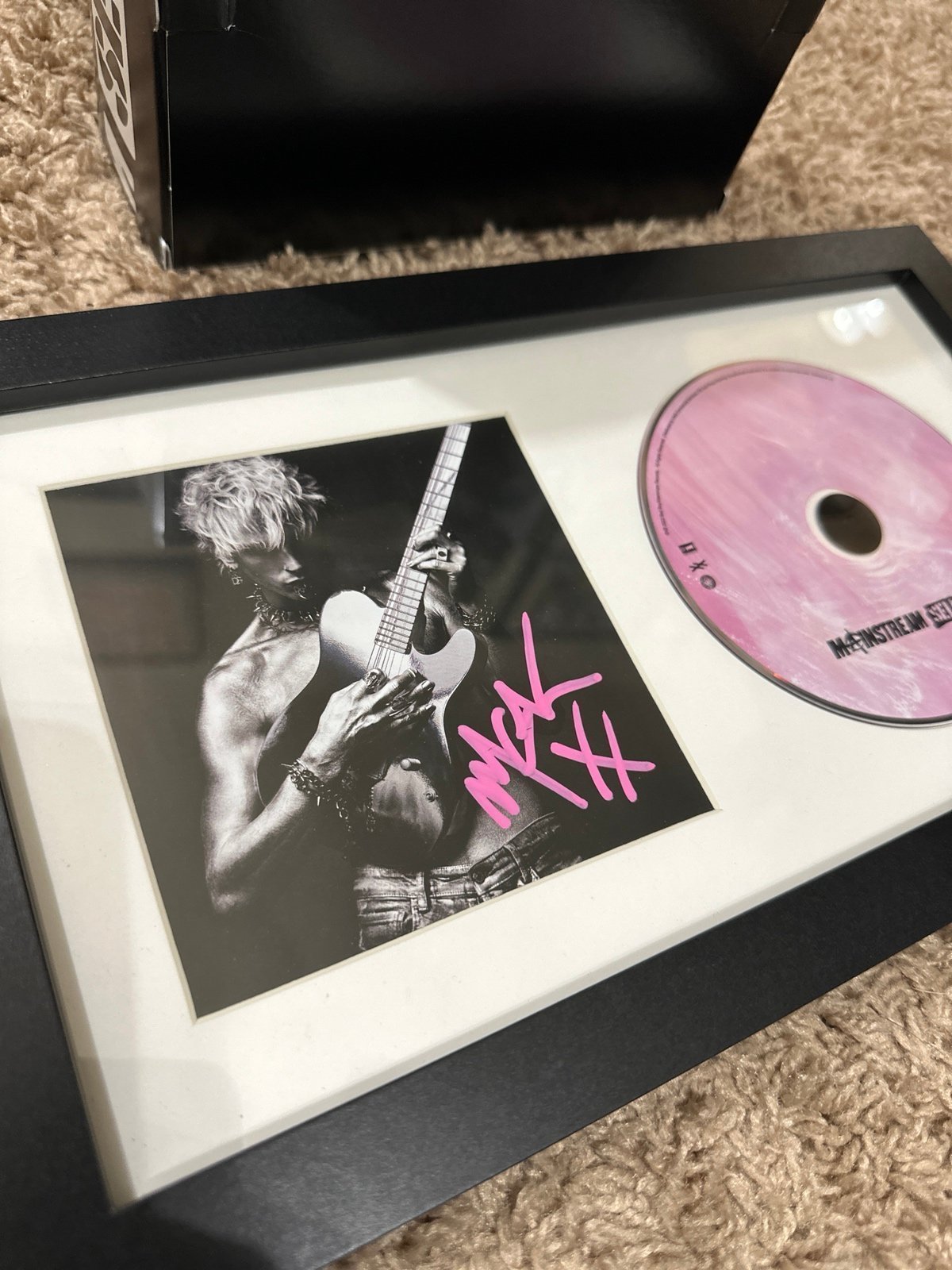 Machine Gun Kelly Signed Mainstream Sellout Framed w/ Medium pink shirt (New)