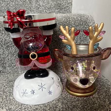 Santa candle holder and reindeer
