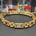 #1137, 10K GP BRACELET, Cz DIA, & GARNET STONE, 7.5 INCHES