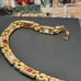 #1137, 10K GP BRACELET, Cz DIA, & GARNET STONE, 7.5 INCHES