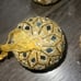 Nicole Miller gold and mirrored glitter beaded ornaments