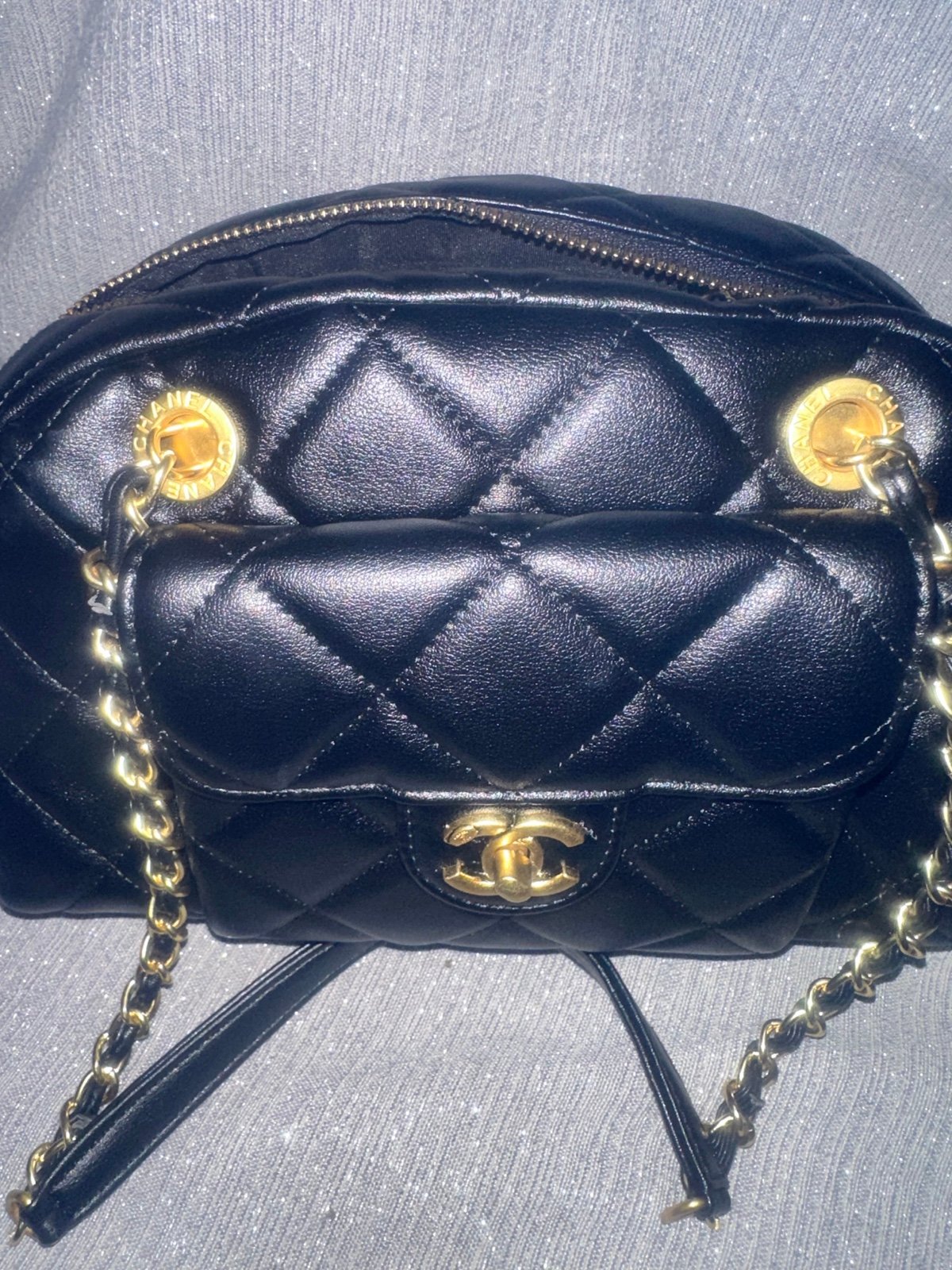 New blk quilted leather shoulder bag. 10”length, 7” height.