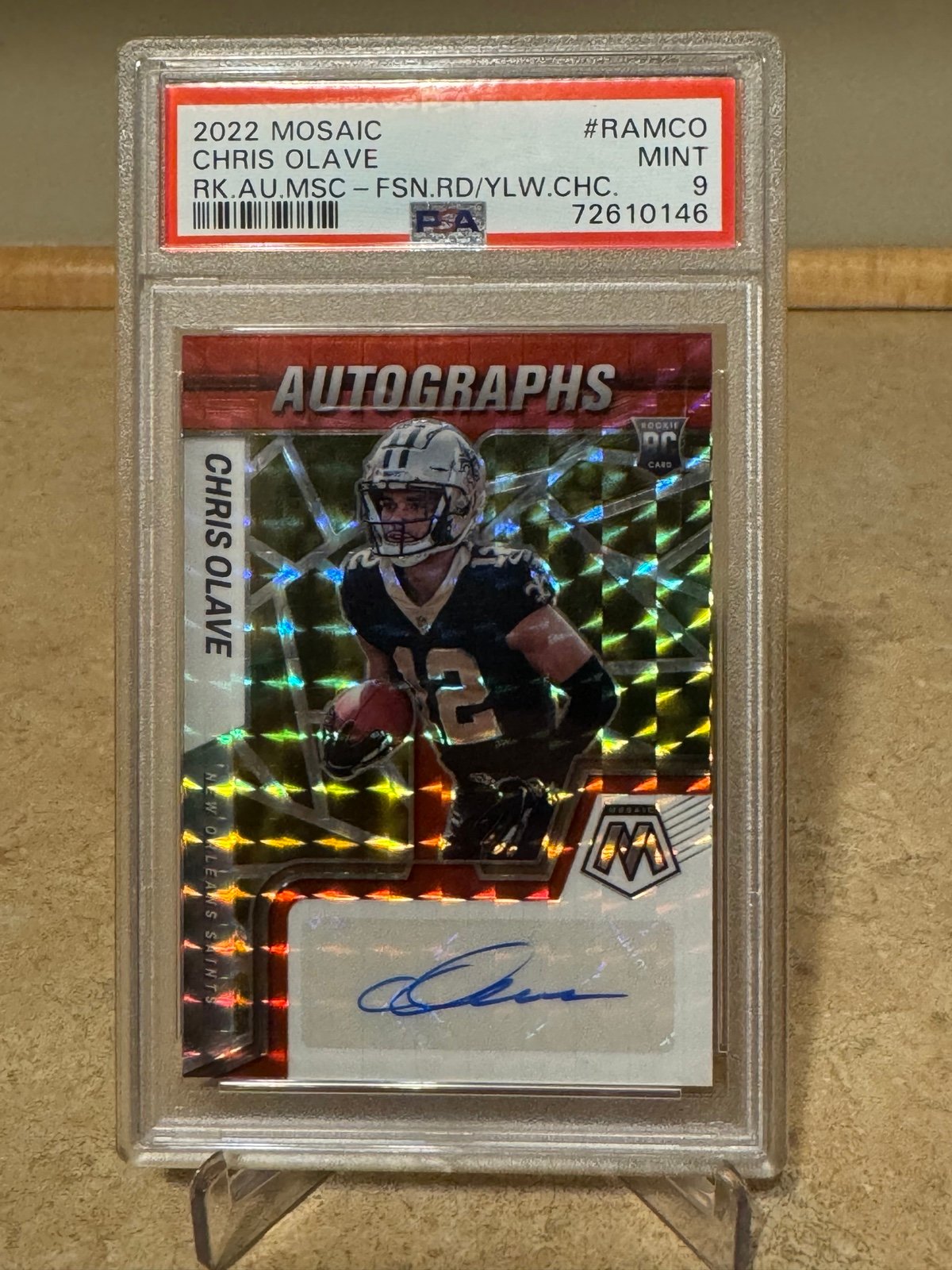 Chris Olave 2022 Mosaic Fuson Red and Yellow Rookie Auto PSA 9