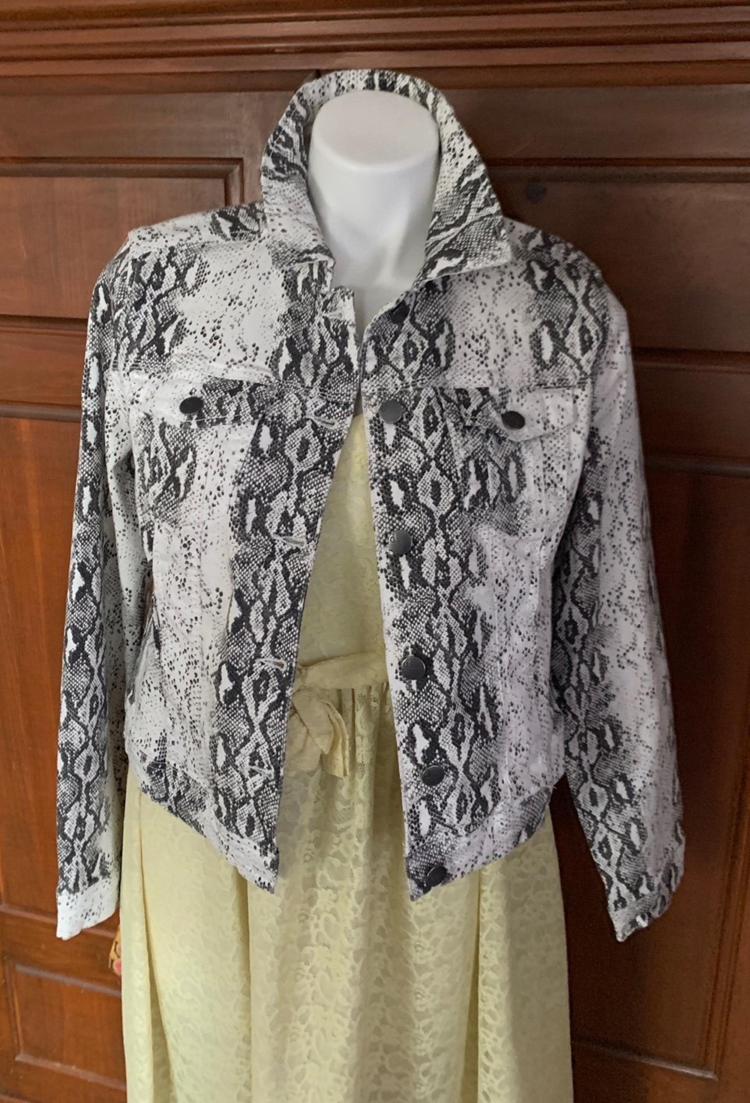 D. Jeans size M snake print jean jacket