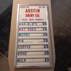 Austin dairy Co. Ad board