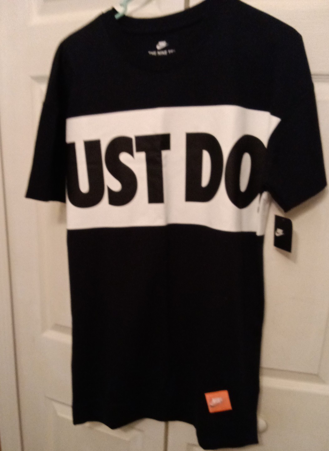 The Nike tee Logo