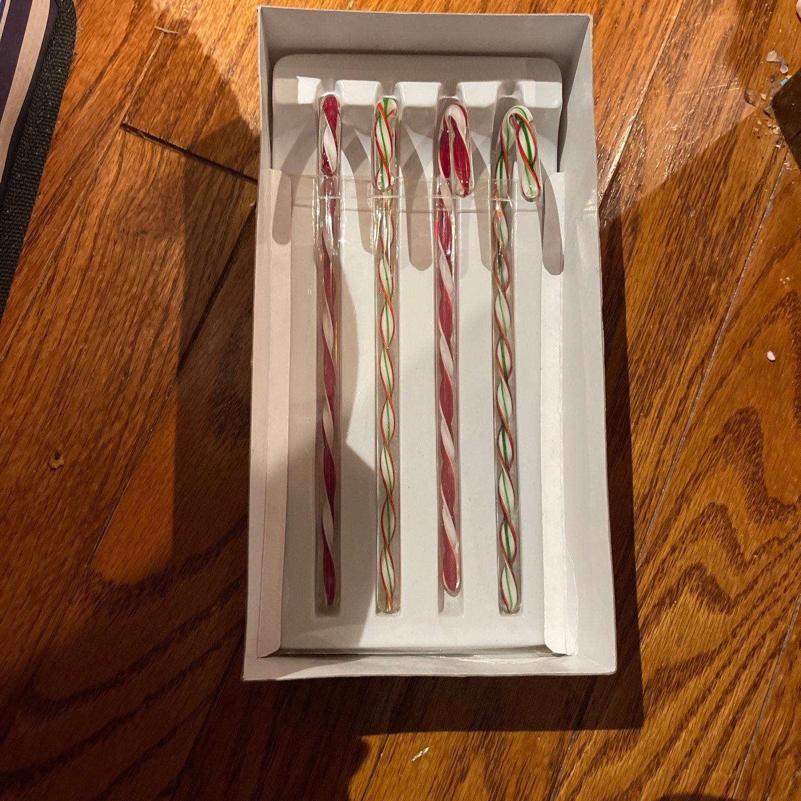 LONGABERGER GLASS CANDY CANE ORNAMENTS. SET OF 4.