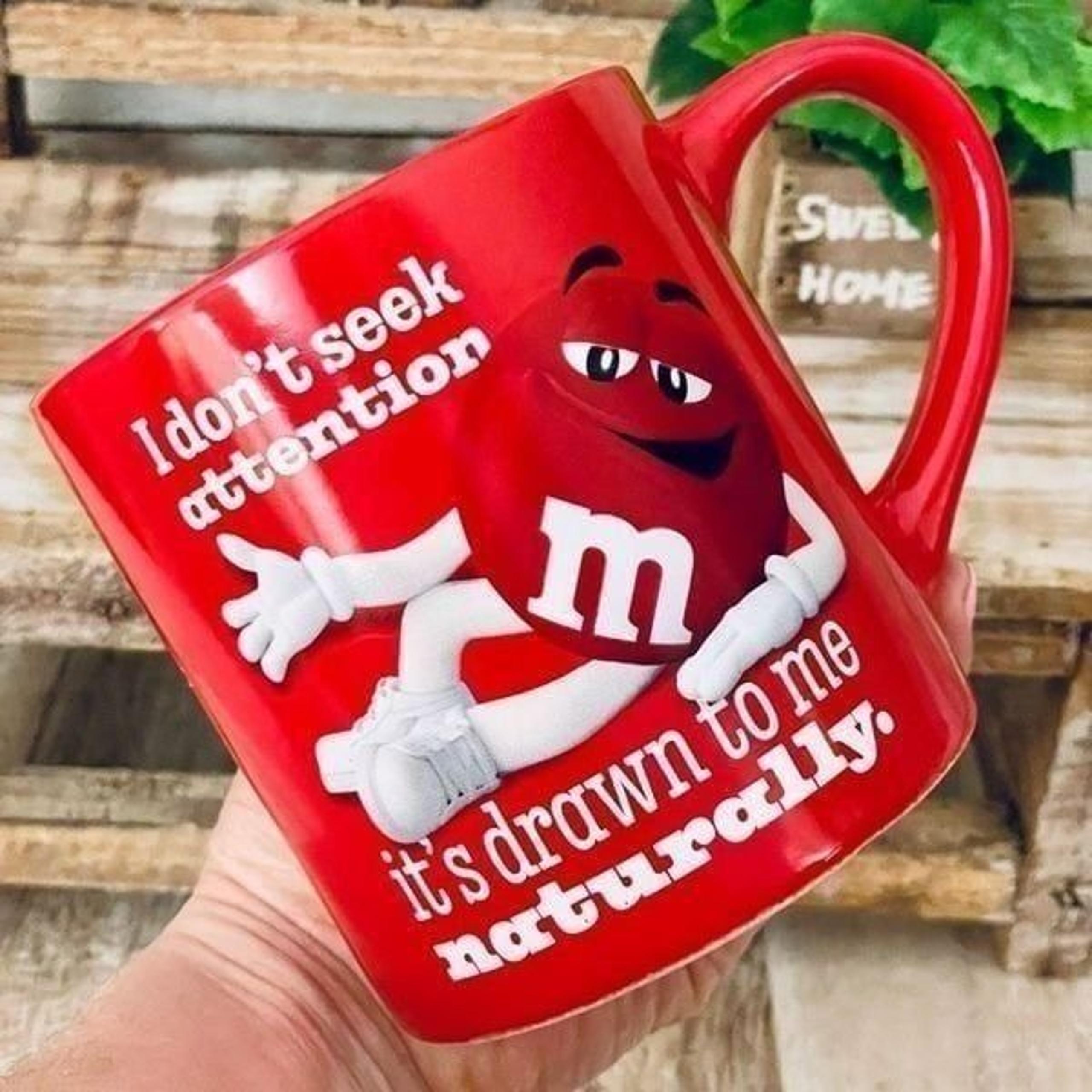 New m&m’s Funny Red I don’t seek attention it’s drawn to me naturally Coffee Mug