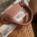 Longaberger Newspaper Basket with liner and protector. Offers Welcome