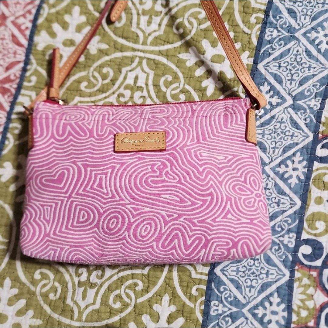 Dooney & Bourke Pink Clutch with Swirling Pattern