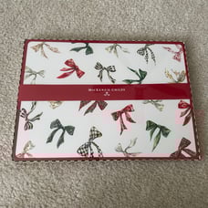 Four Mackenzie-Childs Holiday Bow Placemats