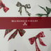 Four Mackenzie-Childs Holiday Bow Placemats