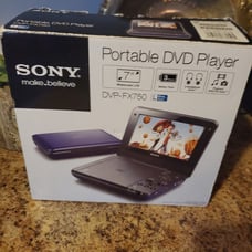 Sony DVP-FX750) 7 widescreen display Portable DVD Player & remote control
