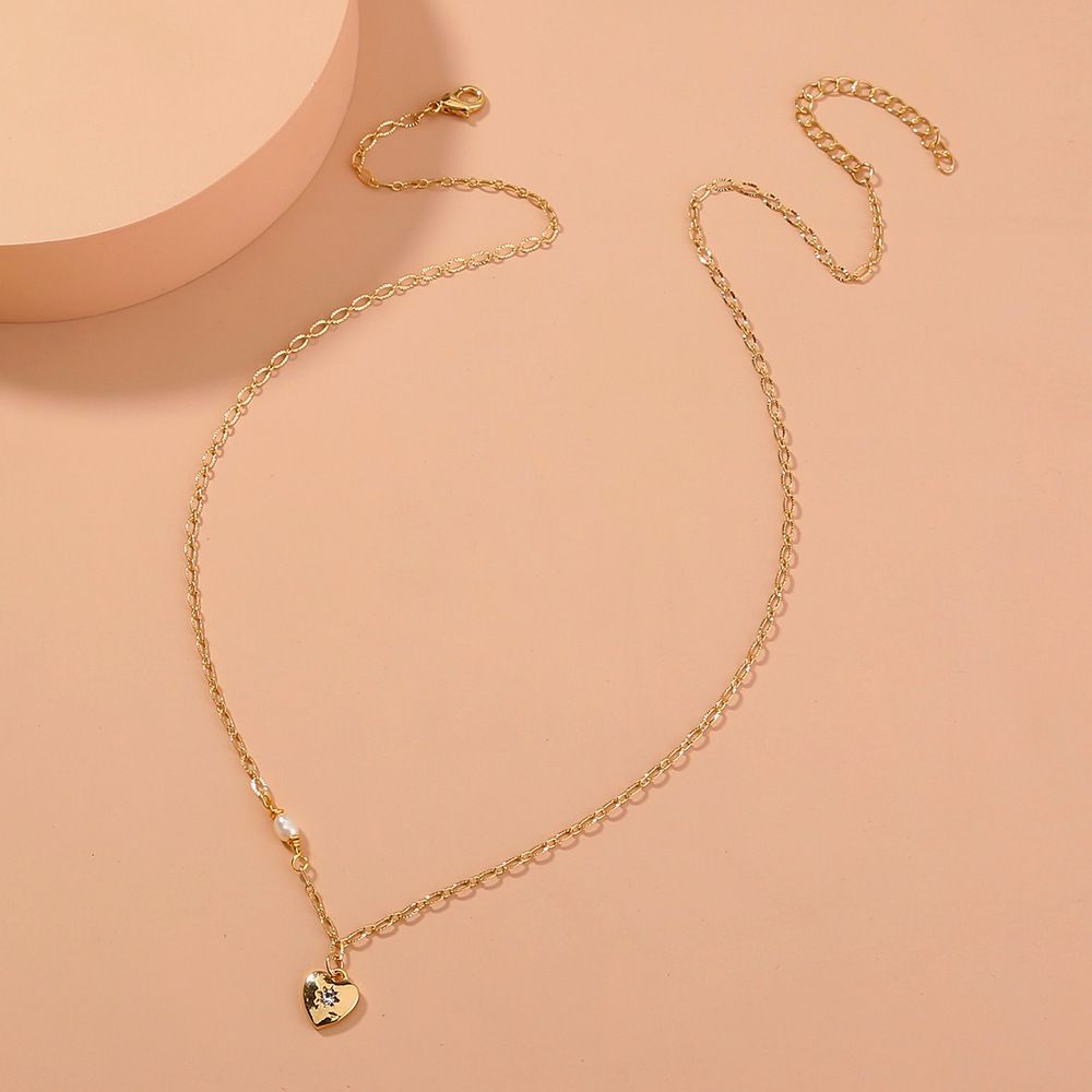 Small fresh personality fashion jewelry Small love heart with diamond pendant ne