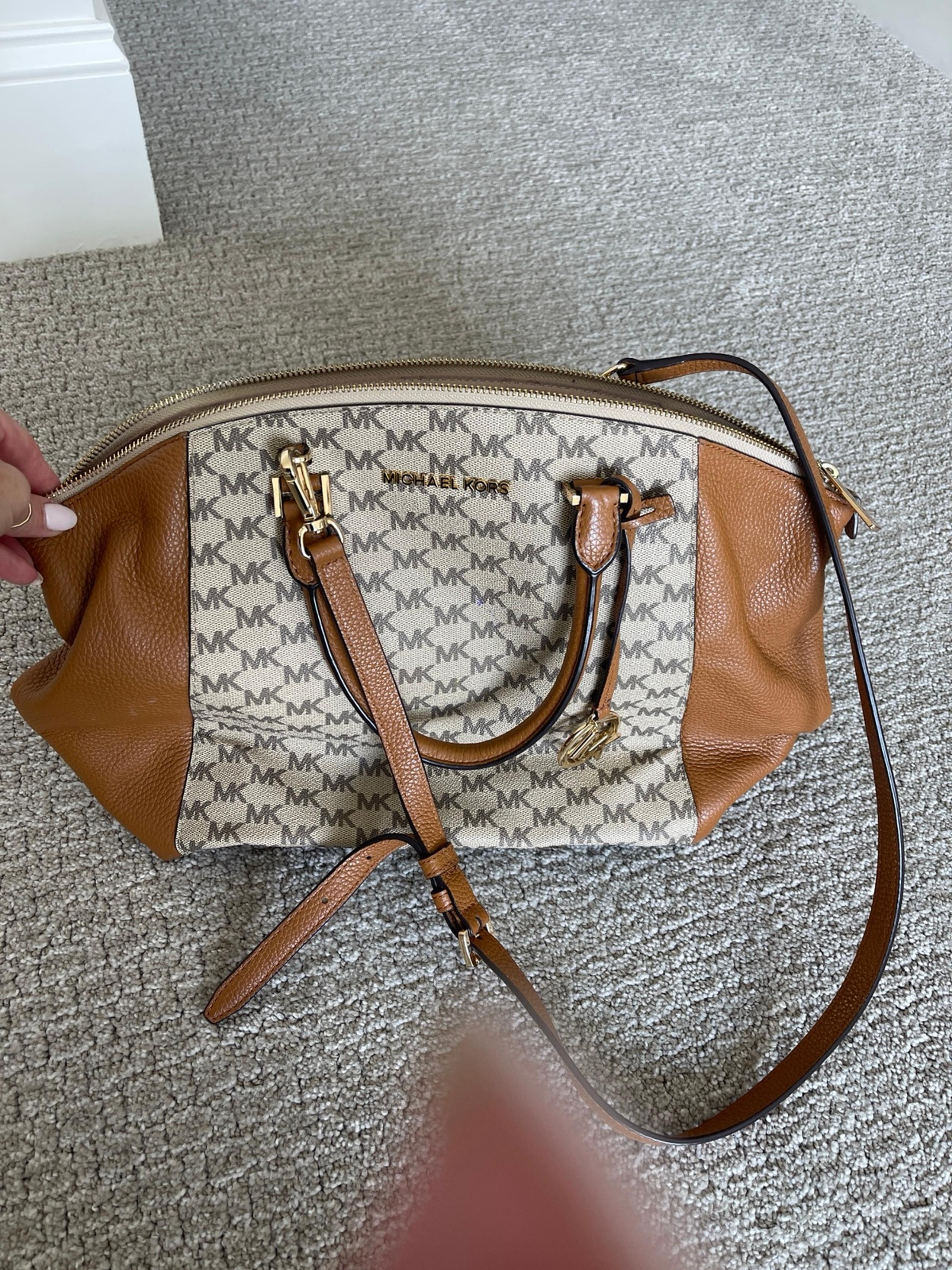 Michael Kors cross body or hand bag option