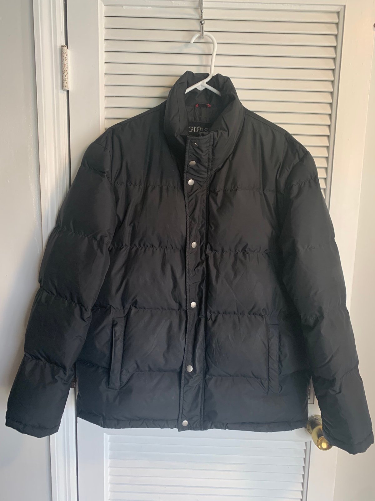 Guess men’s black down feather puffer coat size Large