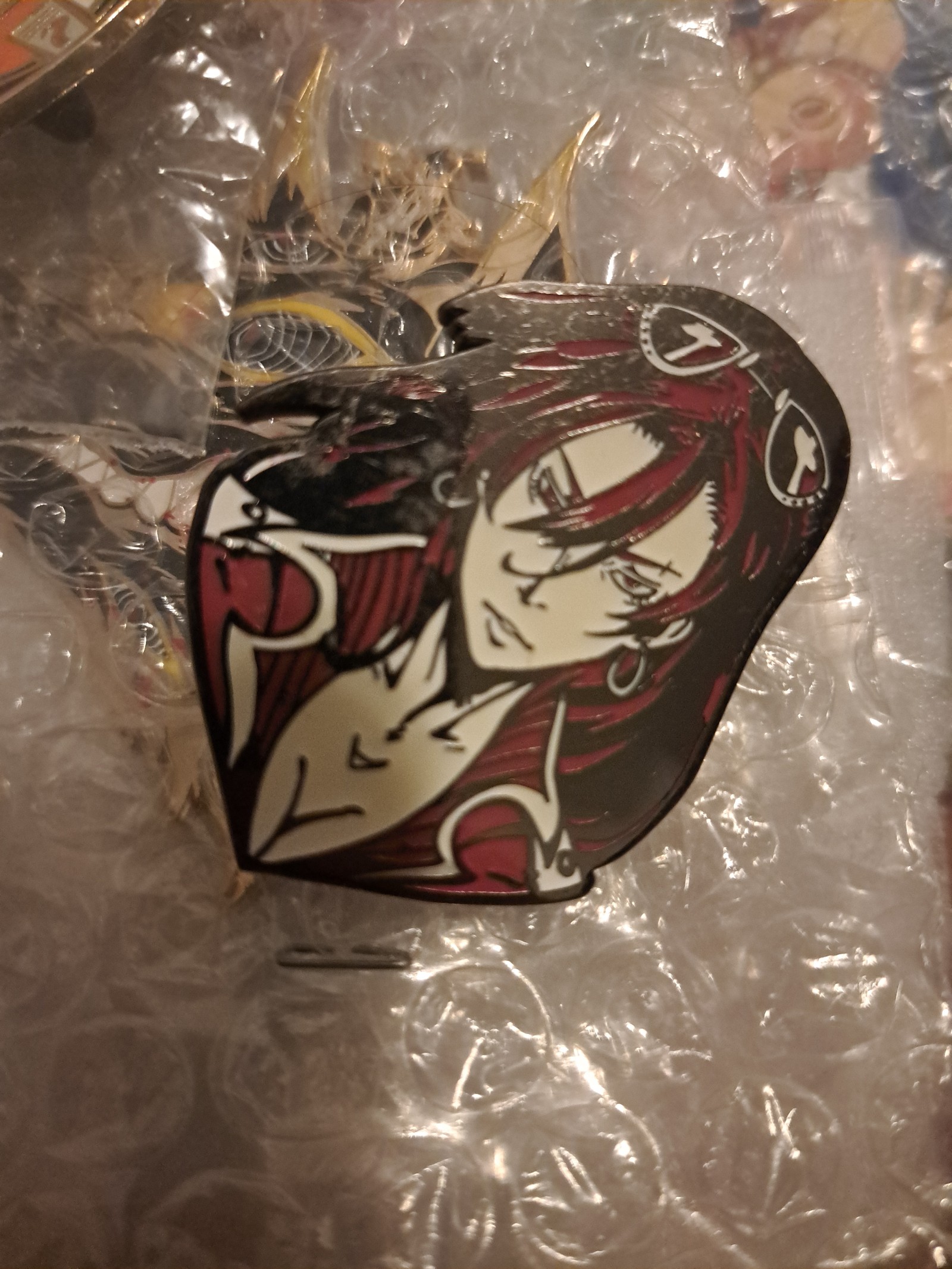 Momo glow in dark pin
