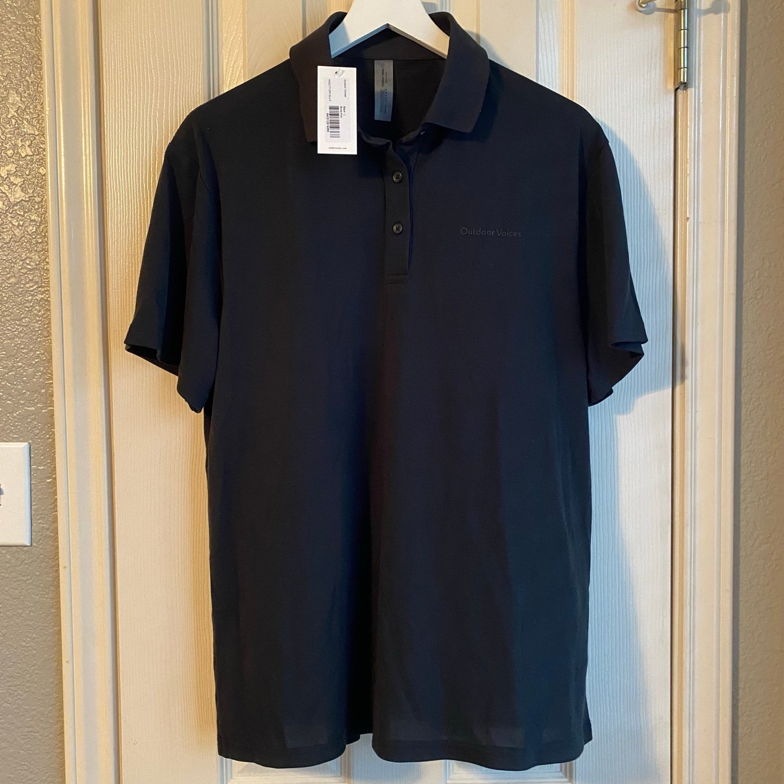 NWT Outdoor Voices Birdie Polo in Black, size Large