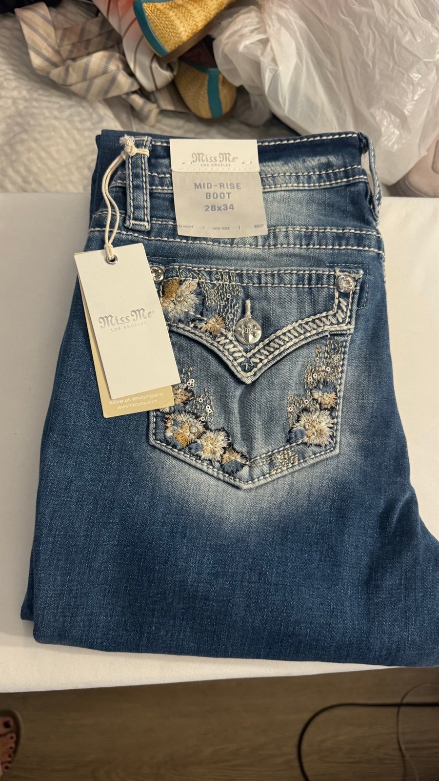 MISS ME WOMEN'S MEDIUM WASH FLORAL BORDER POCKET BOOTCUT STRETCH DENIM JEANS