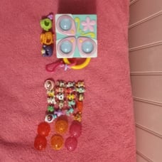 Littlest Pet Shop Teensies lot with costumes, balls, and carrier