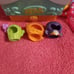 Littlest Pet Shop Teensies lot with costumes, balls, and carrier