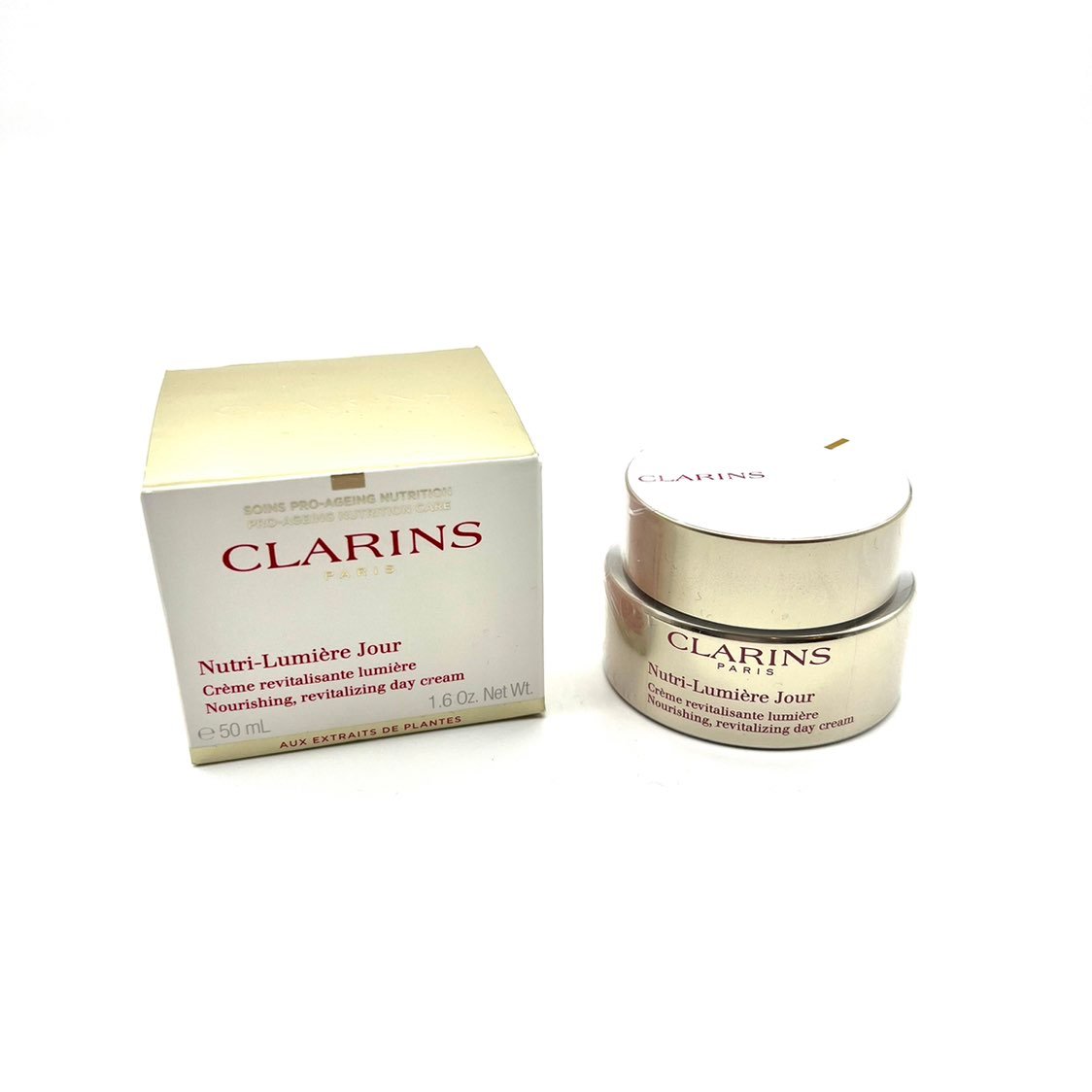 Clarins nutri-lumiere jour cream 1.6oz. 50ml nourishing, revitalizing day cream