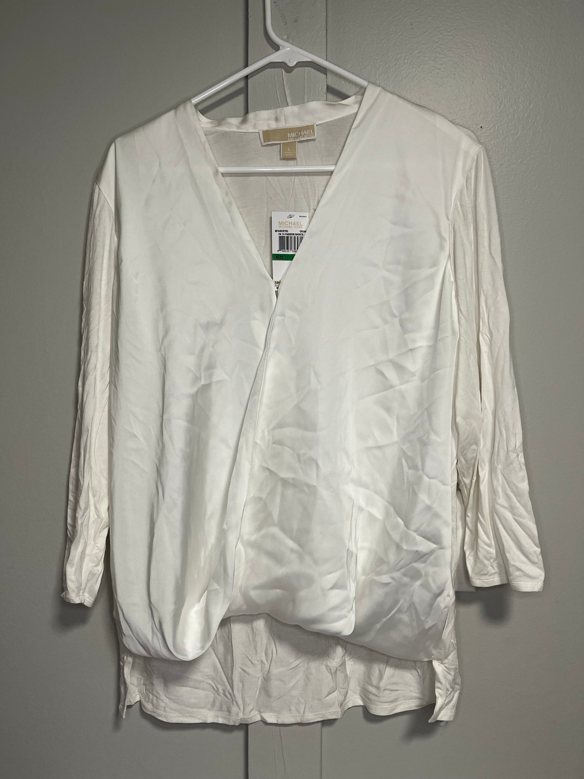 Michael Kors cream v neck blouse size L