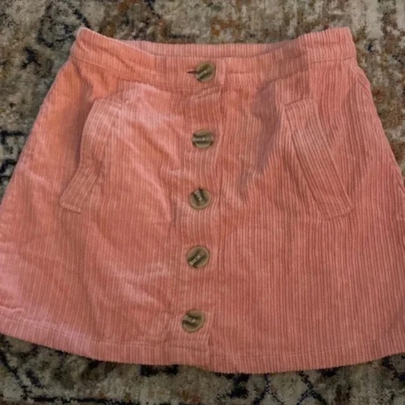 pink corduroy button up skirt